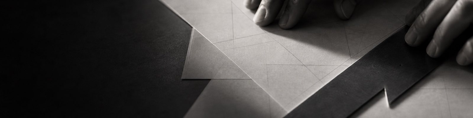Layered paper forms aligned beside a quiet window